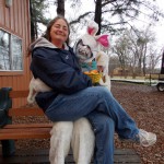 Melanie sitting on the Easter Bunny's lap