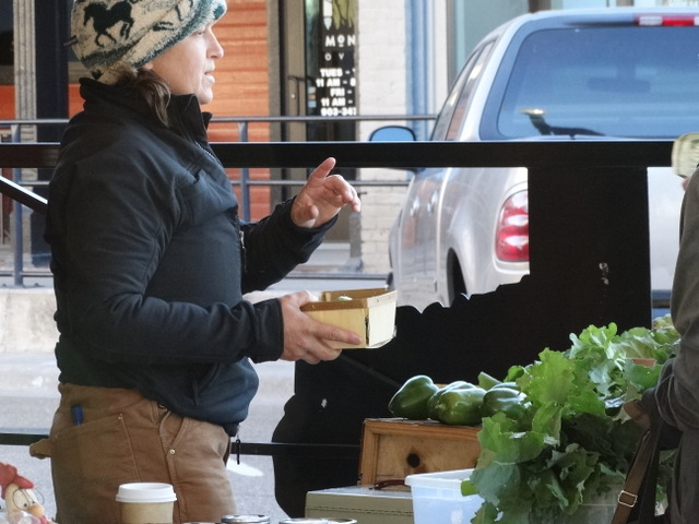 Selling produce on a cold day