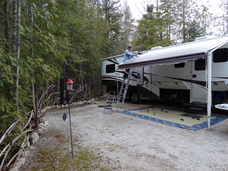Our site with the RV set up and the awning out