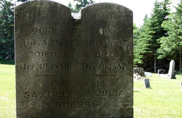 This is the tombstone of two children, one who lived for two years and one who only lived for two days in the 1800s.