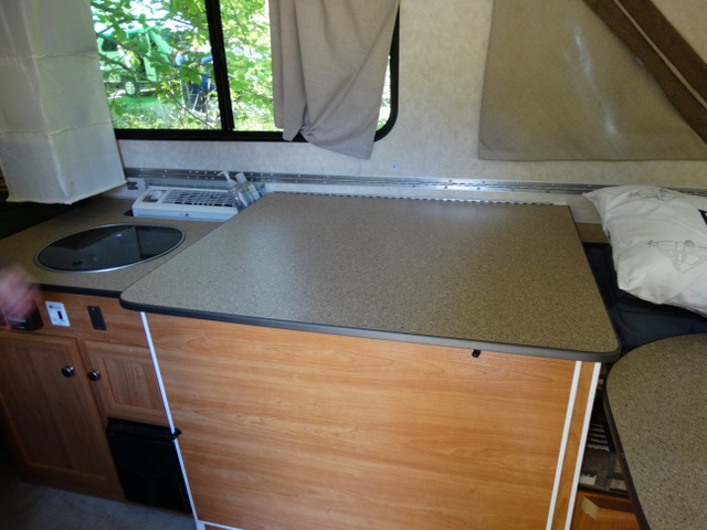 ...and this is the bathroom all folded up and ready to serve as a counter top or have the Aliner top brought down on top of it for travel.