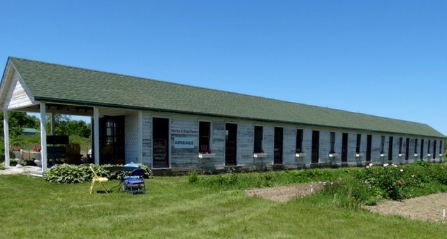 This building has housed everything from WWII German prisoners of war to migrant labor. Now it's a store.