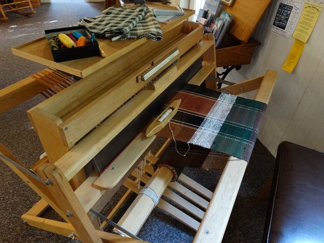 A loom with a work in progress.