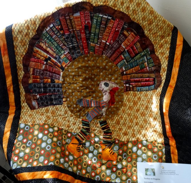 The president of the quilt guild said that this wall hanging had been made by a woman whose almost blind.  She also used a book designed fabric for the turkey's tail feathers.  The book fabric was a challenge piece, meaning that the quilters had to think of some way to use it in a quilt.