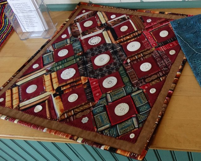 This was the way another quilter used that book fabric.