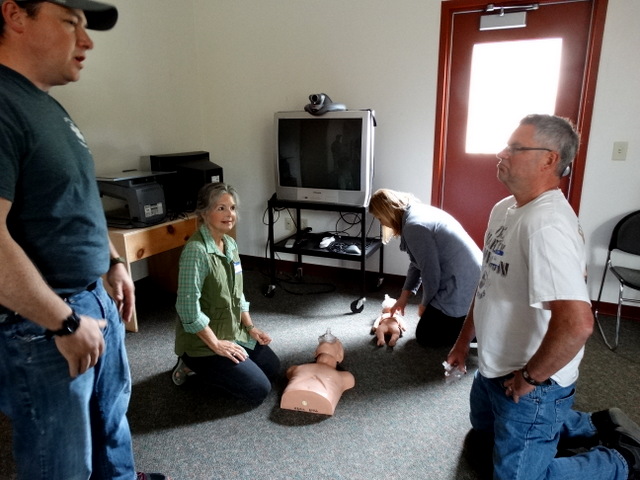 Bob and Cherie on the right, Susan and our CPR/AED instructor on the left.