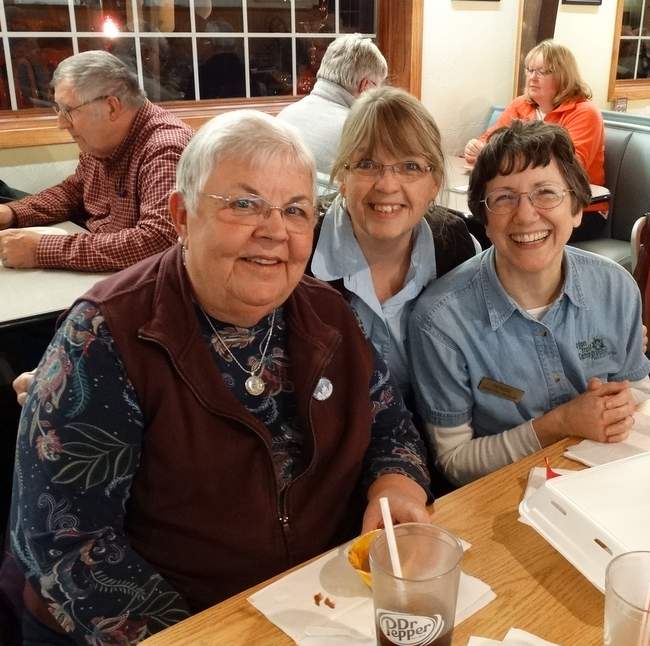 From left to right: Rosanne Curran, Katherine Plahmer, and me.  We had dinner at Jo Jo's Pizza where the owners make and hang their own quilts.