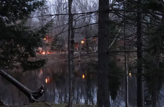 But the campground has a lake and we walked over to check it out around dusk.  Cabin lights and campfires reflected on the water.