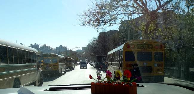 If you look closely behind the school bus, I believe that's an Orthodox Jew.