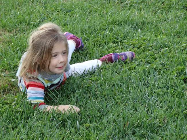 I saw this little girl rolling down a hill.  I could just imagine Martha's grandchildren doing that as well.