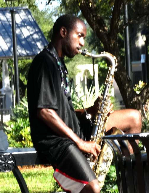 A saxophonist in the park