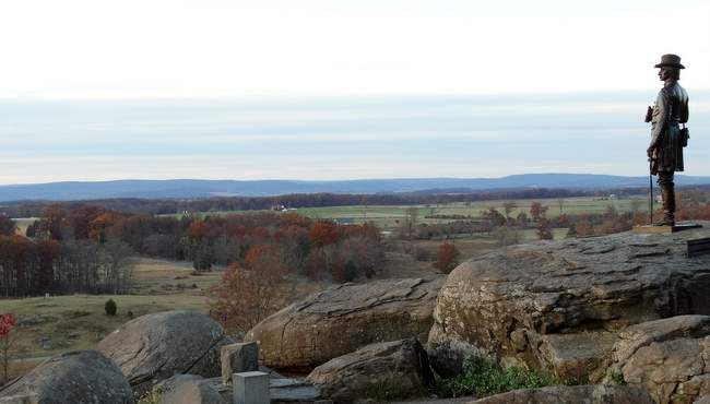 A statue surveying the view from the top of Little Round Top.