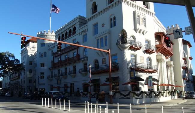 This hotel was built by a competitor, but he could only furnish five of the rooms because he tried to ship furniture from New York on the train.  Flagler owned the train company and the competitor's furniture never arrived.  He went bankrupt and Flagler bought his hotel for cents on the dollar.
