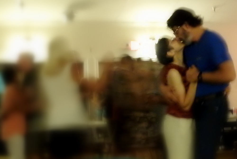 While we were dancing, WD grabbed my Nikon and tried to take a picture of us.