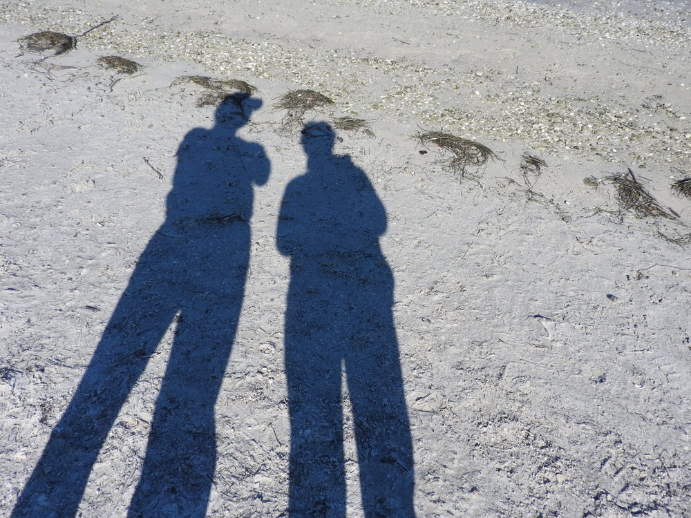 Our long shadows on the beach.