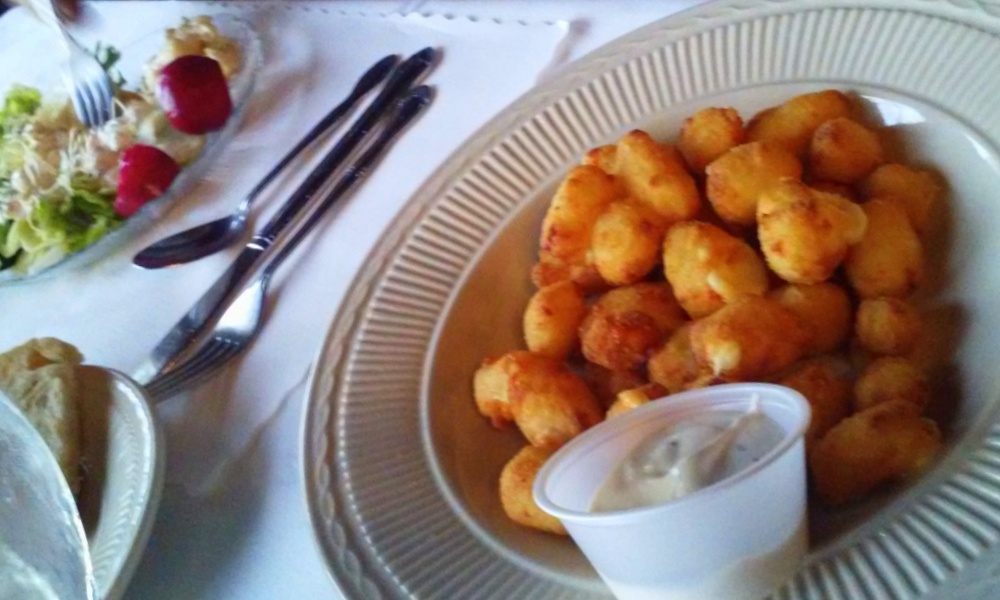 We had heard of Wisconsin cheese curds last summer but never tried them.  Tonight we had them for an appetiser and - yum!  They are fried cheese balls and you can dip them in different sauces. 