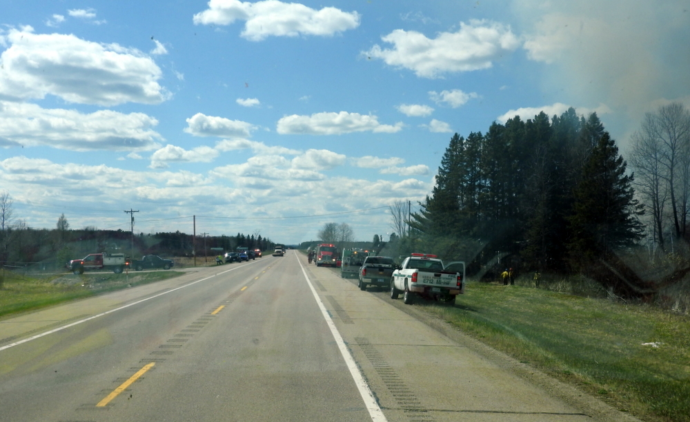 As we continued along the road, we saw a plume of black smoke.