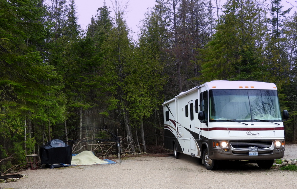 After visiting for a while, we went down to our site and got set up as much as we could in the rain.