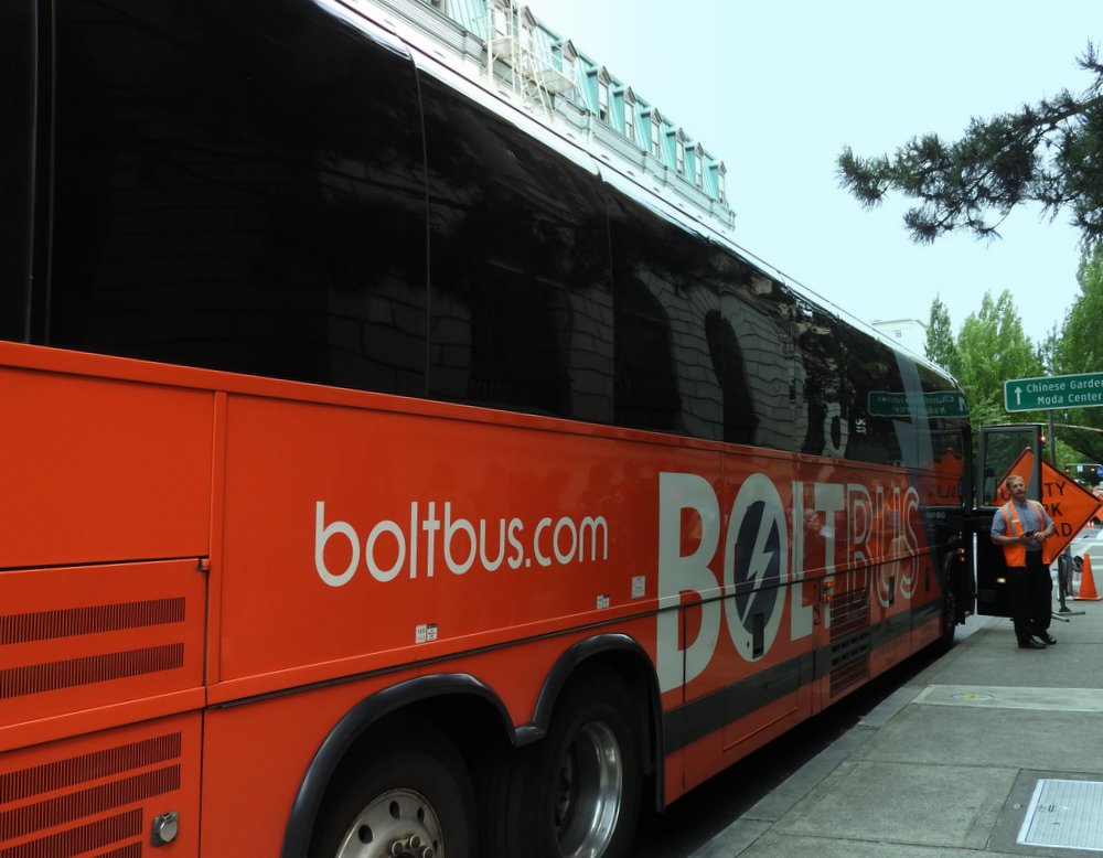 The Bolt Bus is an inexpensive bus line that goes on the west coast and on the east coast.  It only cost me about $30 each way to go between Portland and Bellingham.