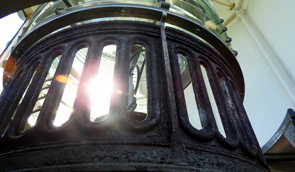 This lighthouse uses a Fresnel lens and an itty-bitty lightbulb and can be seen from eighteen miles away. It's fully automated now.