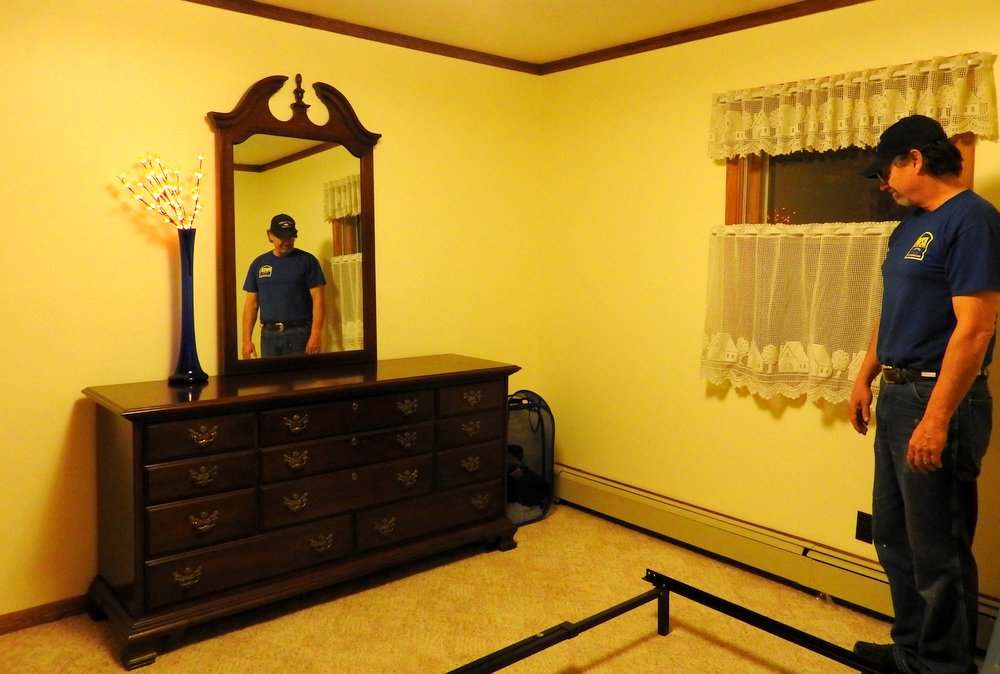 Tonight we brought the dresser and mirror in. We can finally put our clothes away!
