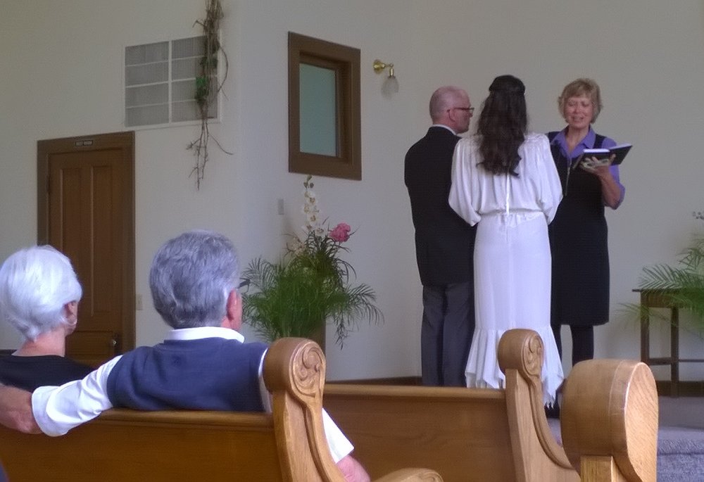 During the reading and the song, the bride, the groom, and the minister all started crying, but with Kleenex in hand, they carried on with the ceremony.